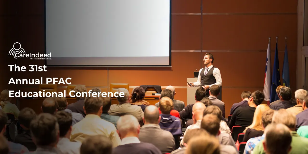 Male speaker in front of audience